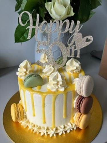 custom cake design with macarons Audrey Caldwell Cakes Meath Ireland